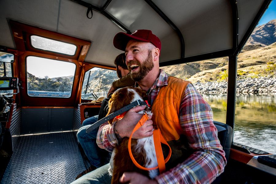 man holding his dog