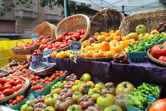 photo of tomatoes on a table at a farmers market