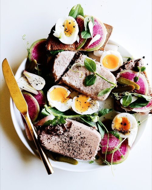 Olympia Provisions Pate with seasonal vegetables and quail eggs