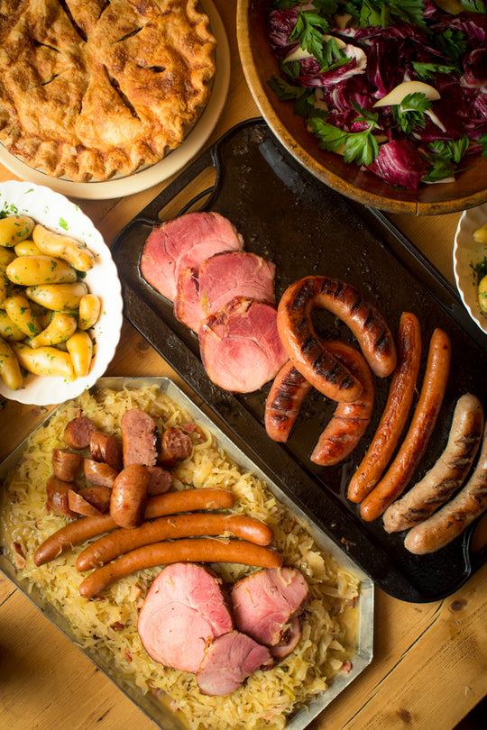 a full Thanksgiving dinner featuring sweetheart ham, bratwurst, kielbasa and frankfurters from Olympia Provisions