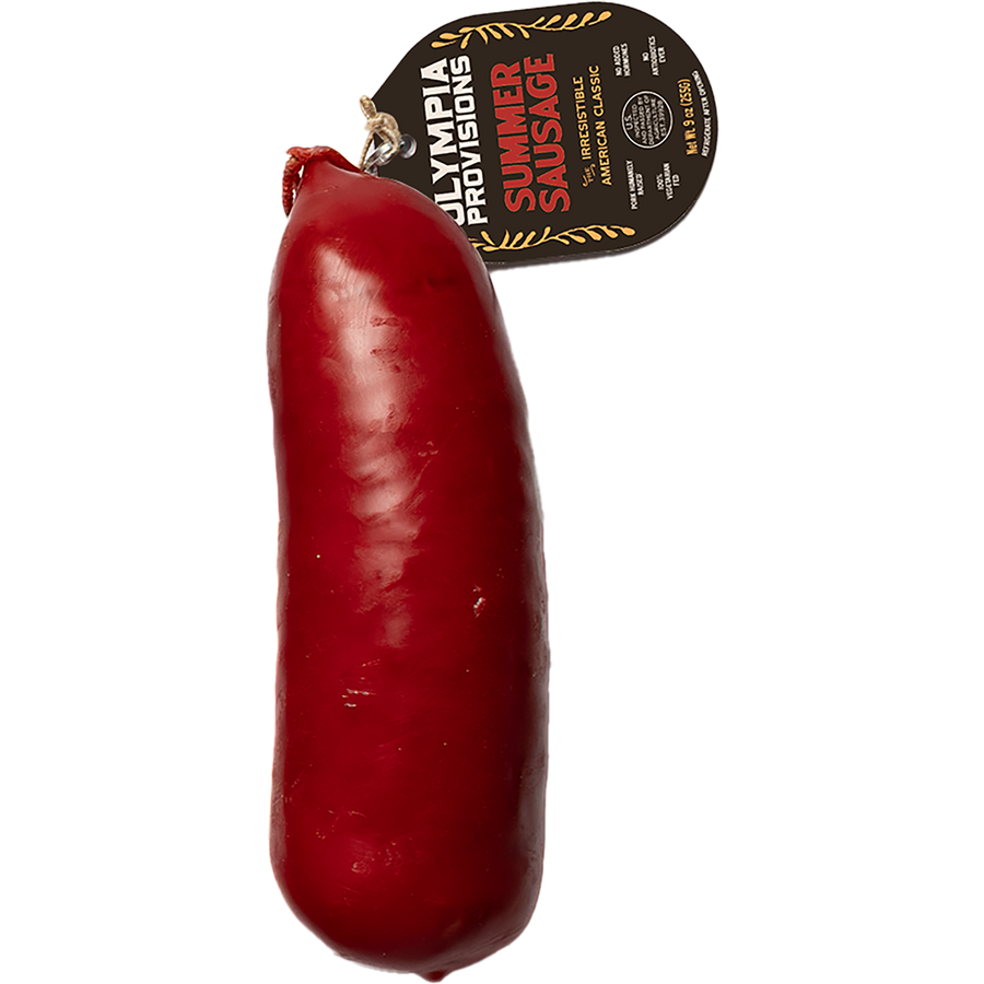 Olympia Provisions summer sausage sausage sealed in red cheese wax.