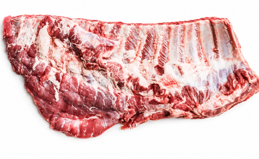 Raw pork ribs with bone and fat marbling, photographed on a plain white background.