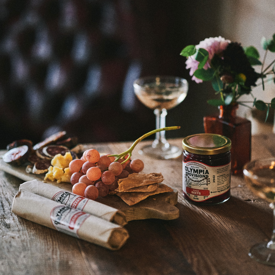 Charcuterie Board with salami and pickles | Olympia Provisions