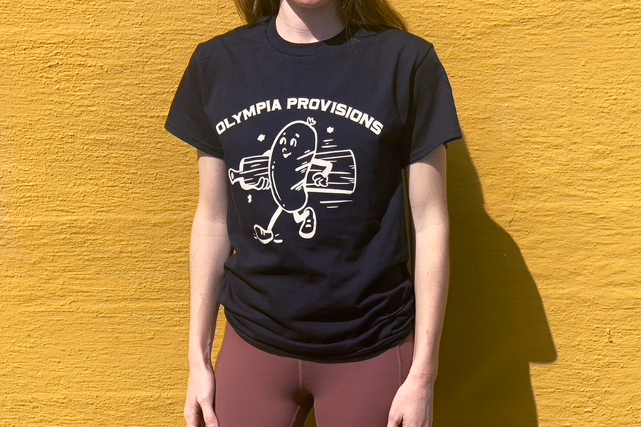 Person wearing an Olympia Provisions Sausage Tee